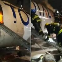 Video / Kargo avion se zapalio pri slijetanju, piloti se spasili pomoću užeta 